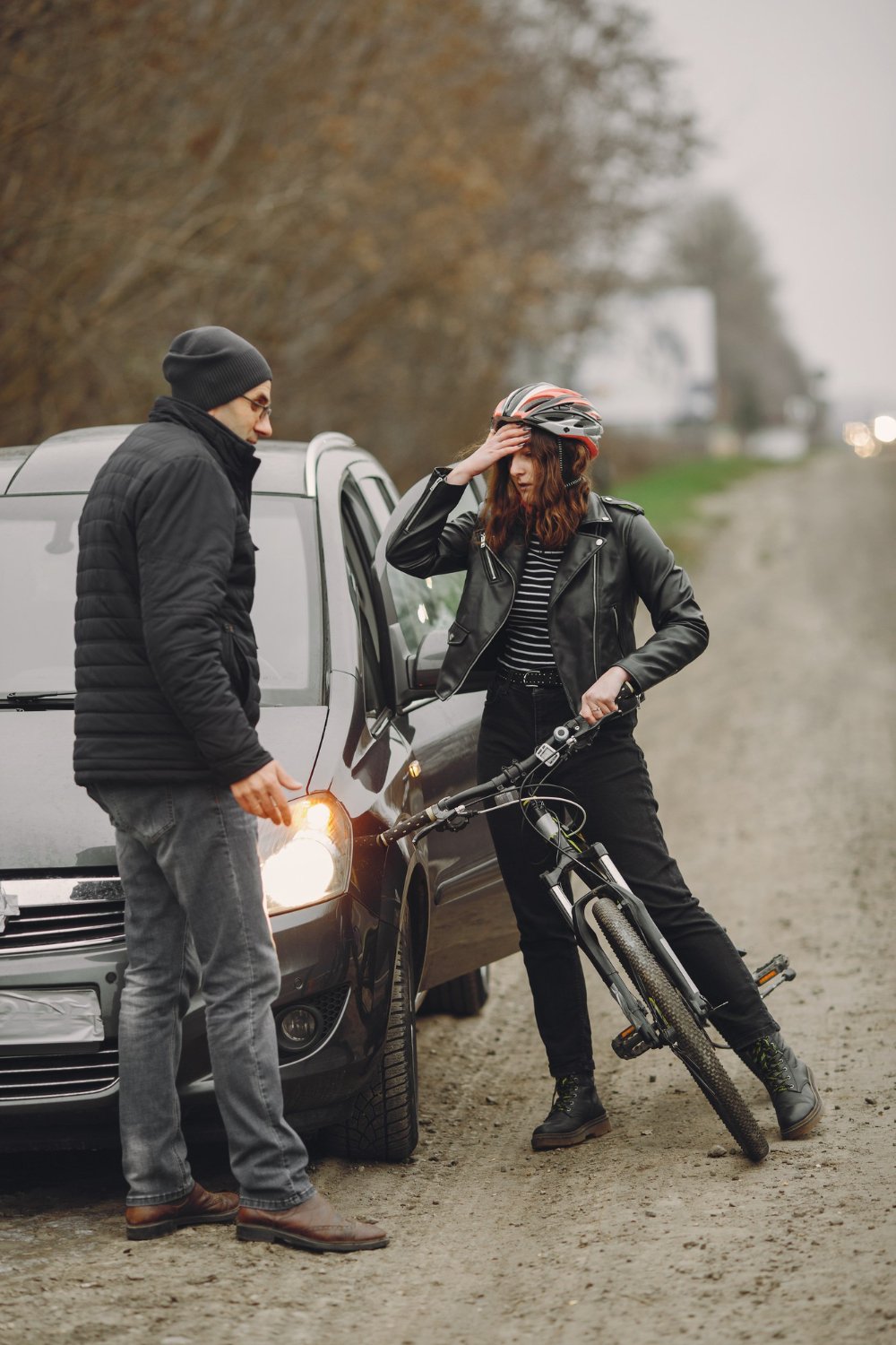 Cyclist riding on a city street, representing the bicycle accident claims Lionsgate Law Group APC handles